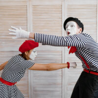 Two clowns, mime artists, boxing parody, comedy